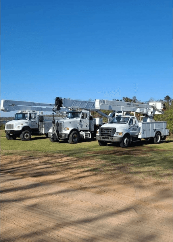 Three service trucks from Bordelon's fleet